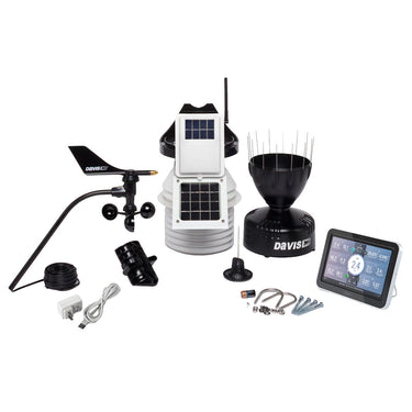 Davis Instruments weather station setup with an anemometer, solar sensor suite, rain gauge and digital display