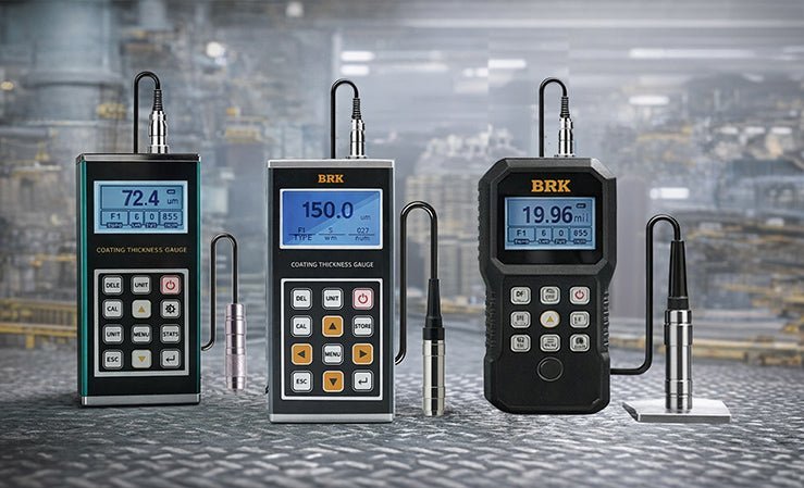 Three BRK coating thickness gauges display different measurements, showcasing models for industrial coating inspections.