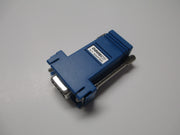 Blue nine-pin serial port adapter by Davis Instruments featuring metal connector and screws.