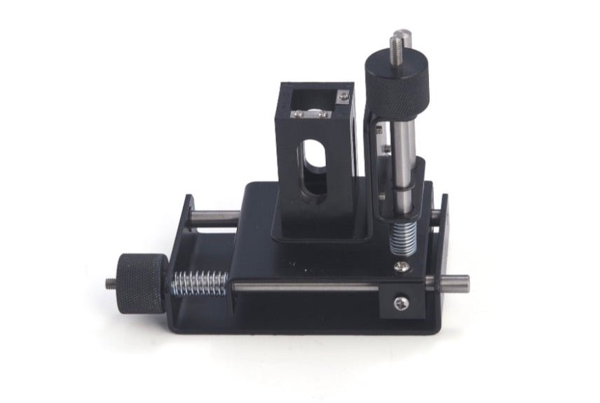 Adjustable cell holder for micro cuvettes by Sper Scientific, made of black metal with silver adjusters.