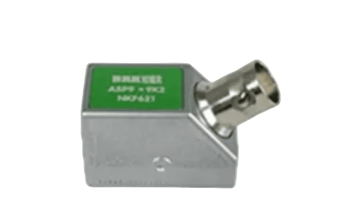 Angle beam probe by BRK, featuring a green label and a metal connector angled at the top.

