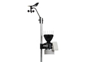 Complete weather station by Davis Instruments on a metal pole including a rain collector and anemometer.
