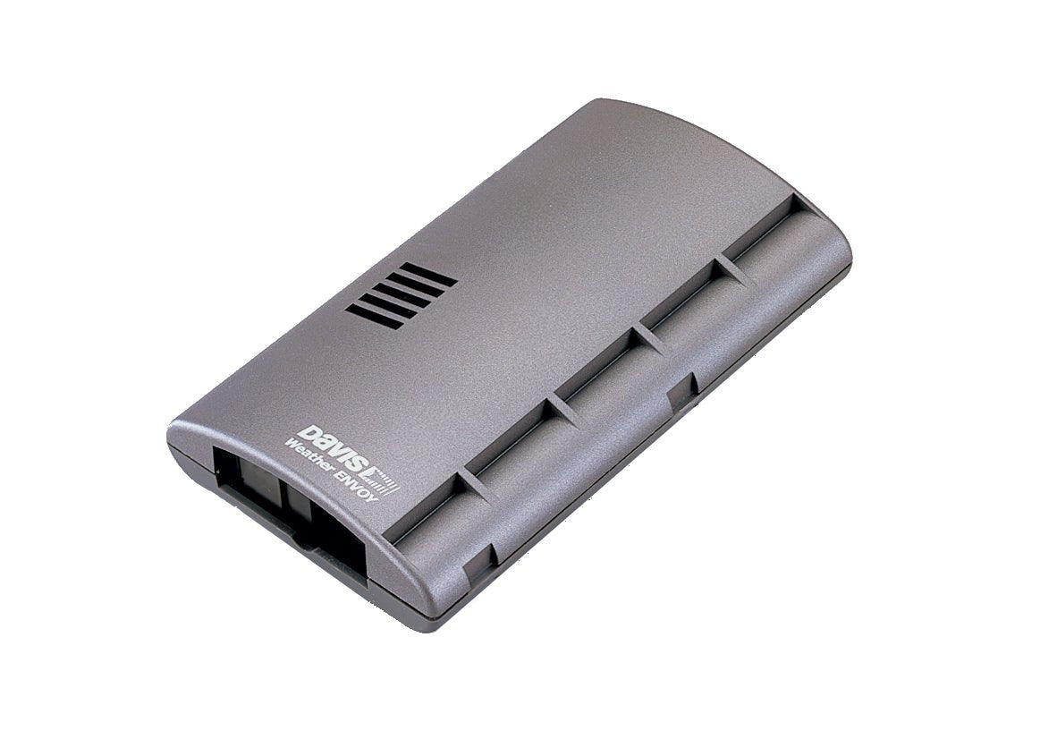 Gray cabled weather data collection envoy from Davis Instruments with ventilation slots on top.