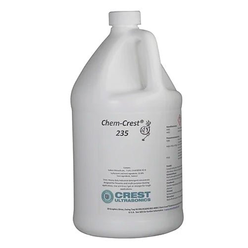 One gallon bottle of ultrasonic cleaning solution by Crest Ultrasonics, featuring a white plastic container with a handle.
