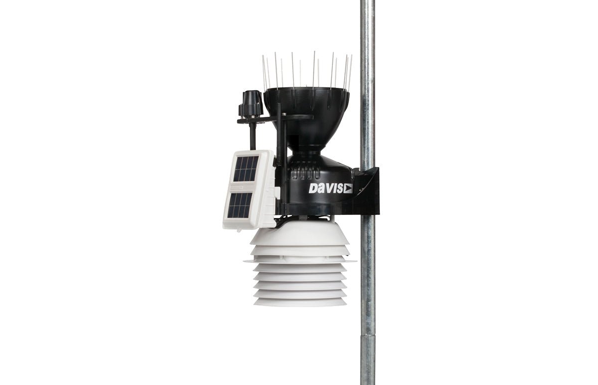 Daytime fan aspirated radiation shield kit by Davis Instruments, on a metal pole.