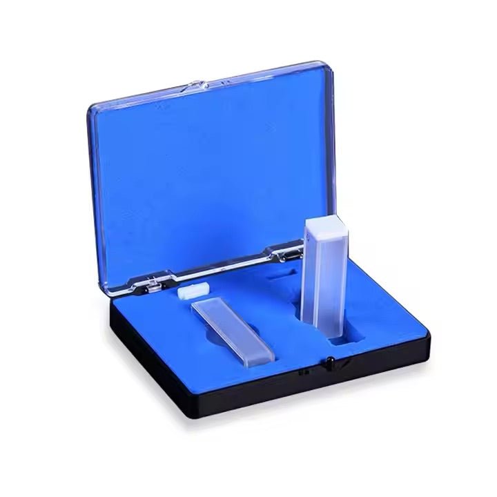 Spectrophotometer micro cuvettes with lid by Sper Scientific in an opened blue storage box with black trim.

