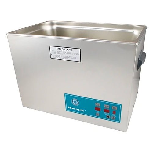 Stainless steel benchtop cleaner tank by Crest Ultrasonics, with a control panel and a handle.