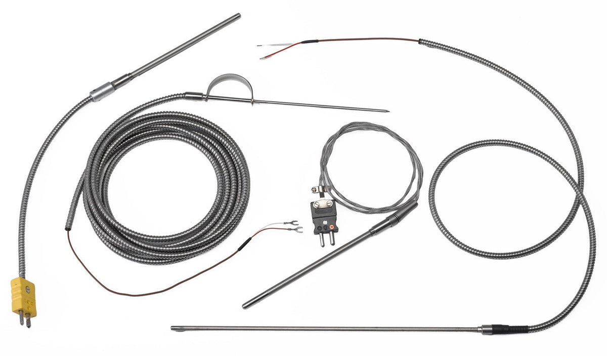 Thermocouple with extension wire by Pyromation, with coiled metal sheathing and various probe and connector types.
