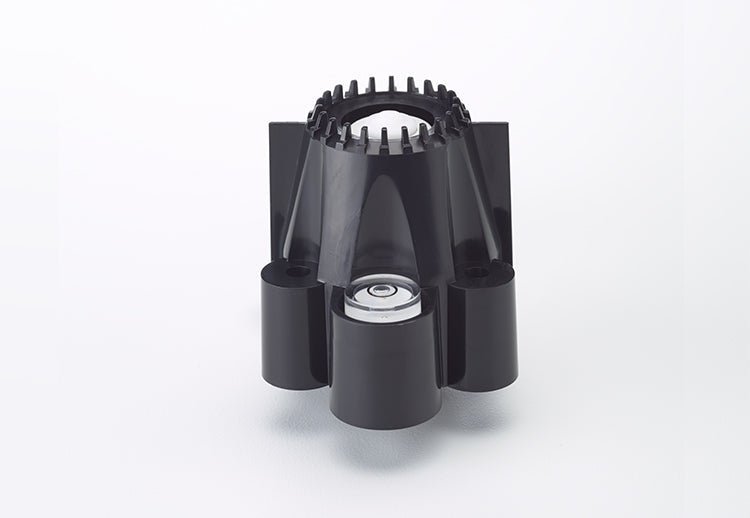 Black UV sensor by Davis Instruments with four cylindrical ports and central bubble level indicator.