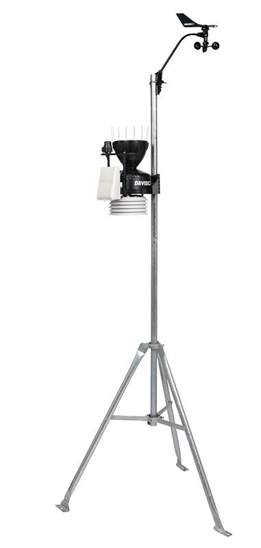 Cabled sensor suite weather station by Davis Instruments on a silver tripod base.