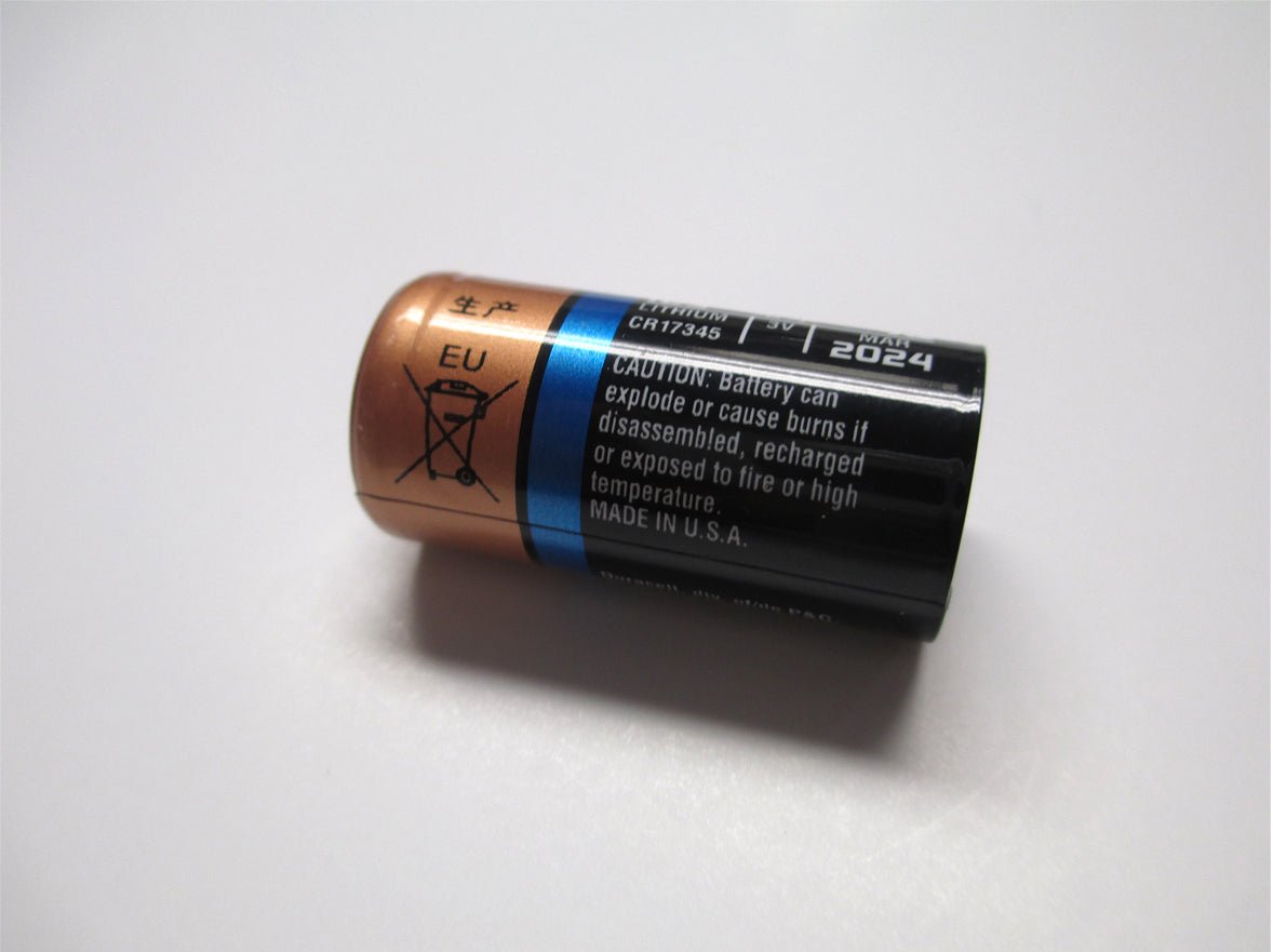 CR17345 lithium 3V battery from Davis Instruments with a bronze, blue, and black label featuring safety information.
