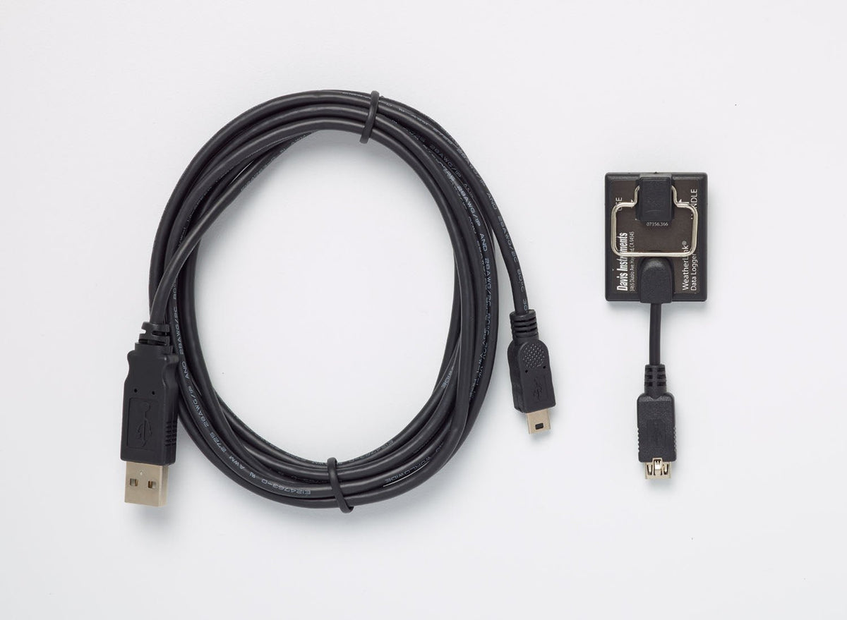 Black data logger by Davis Instruments with USB cable for data collection.