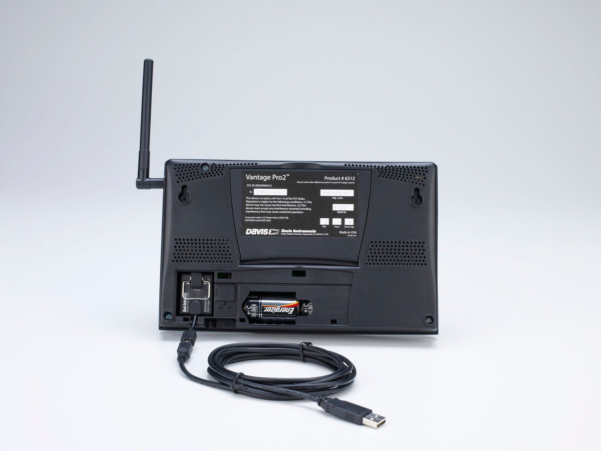 WeatherLink USB data logger by Davis Instruments showing the back panel with cable and battery.