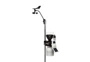 Wireless sensor suite weather station from Davis Instruments with a fan-aspirated radiation shield, mounted on a steel pole.