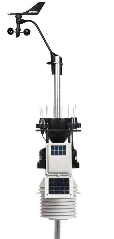 Wireless weather station with fan-aspirated radiation shield by Davis Instruments, featuring an anemometer and solar panels.