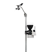 Wireless weather station by Davis Instruments featuring a rain collector, anemometer, and solar panel.