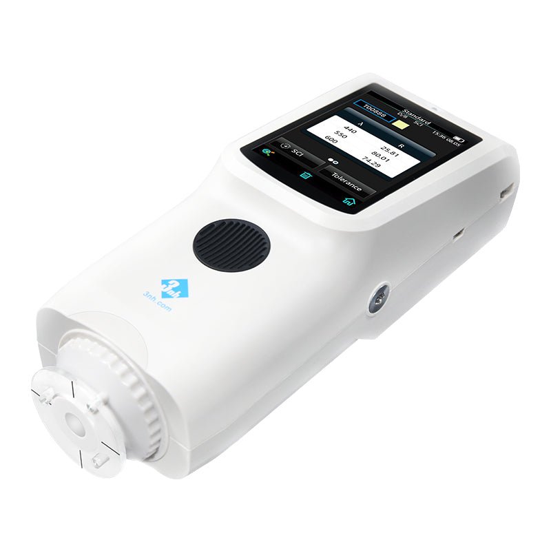 White handheld spectro colorreader by 3nh with a black display screen and round black button.